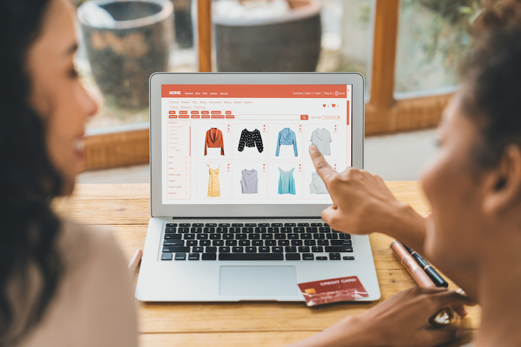 Woman shopping online on internet marketplace browsing for crucial sale items